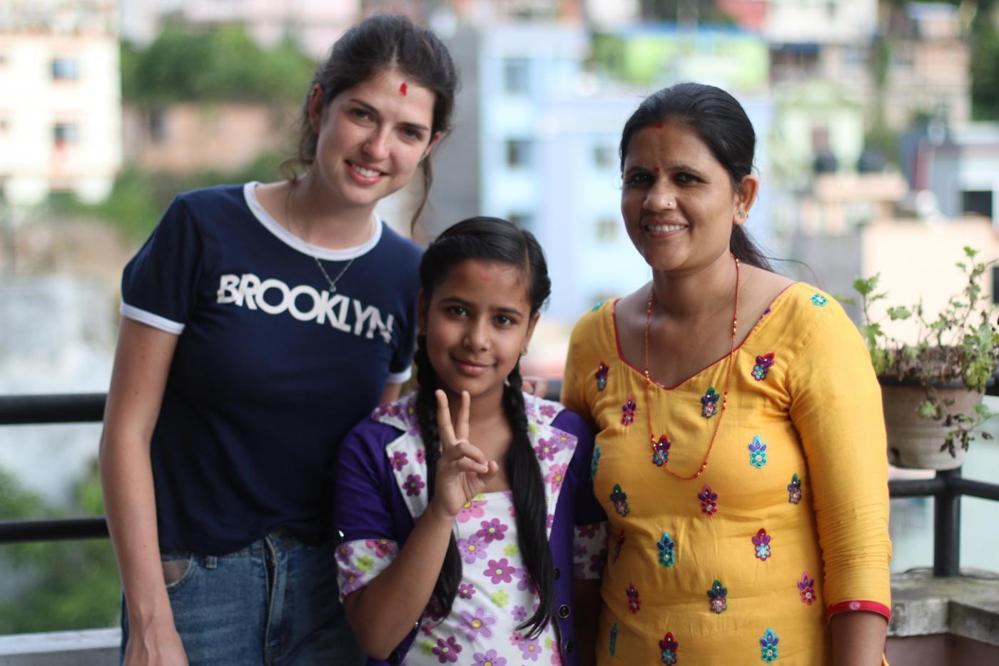 The writer, Jenna Kunze, with one of her couchsurfing host families.