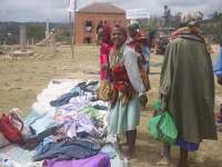 Women in Madagascar inspect the 