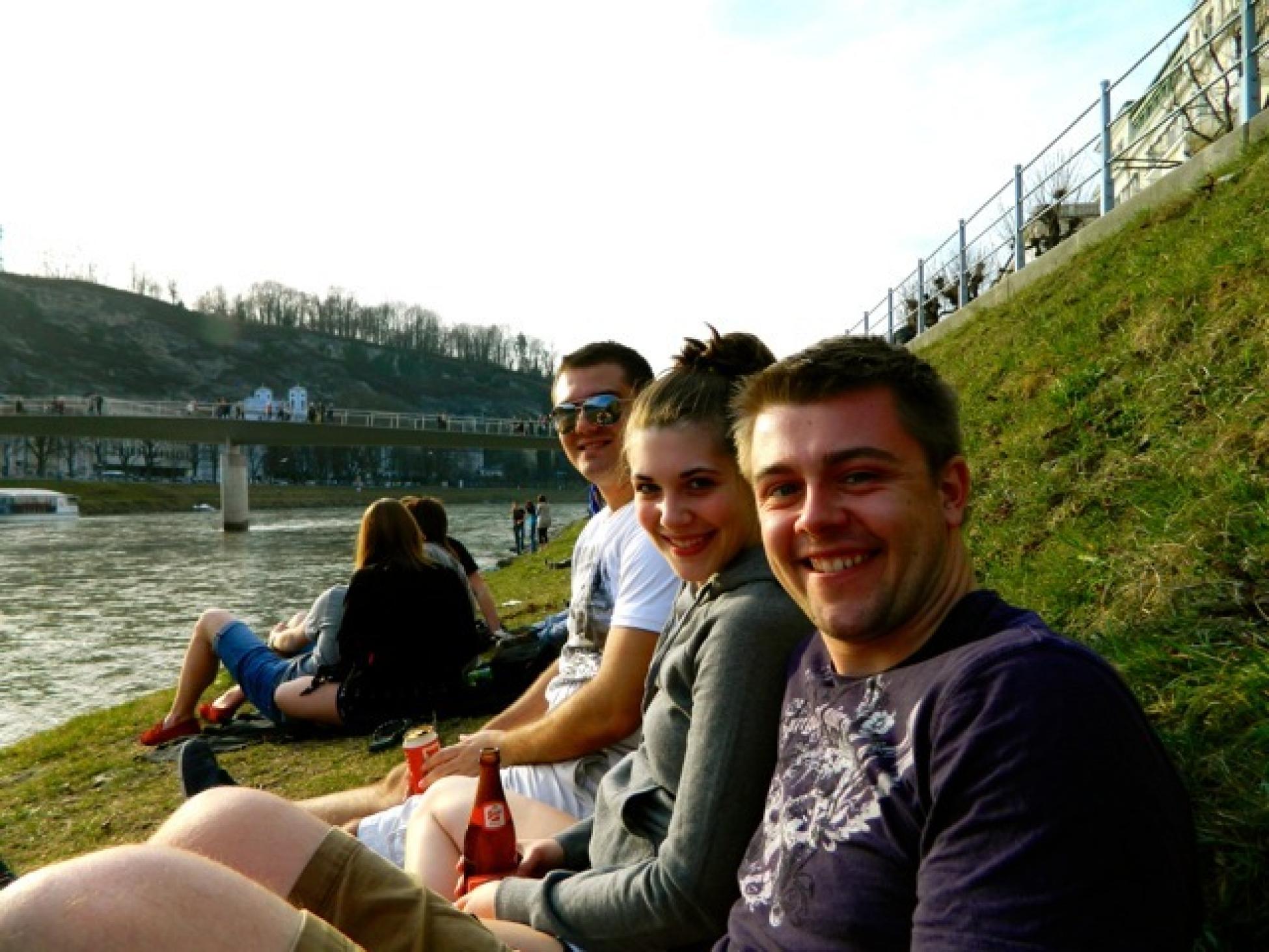 Emily (middle) takes advantage of spring abroad with two friends in salzach river in Salzburg, Austria.